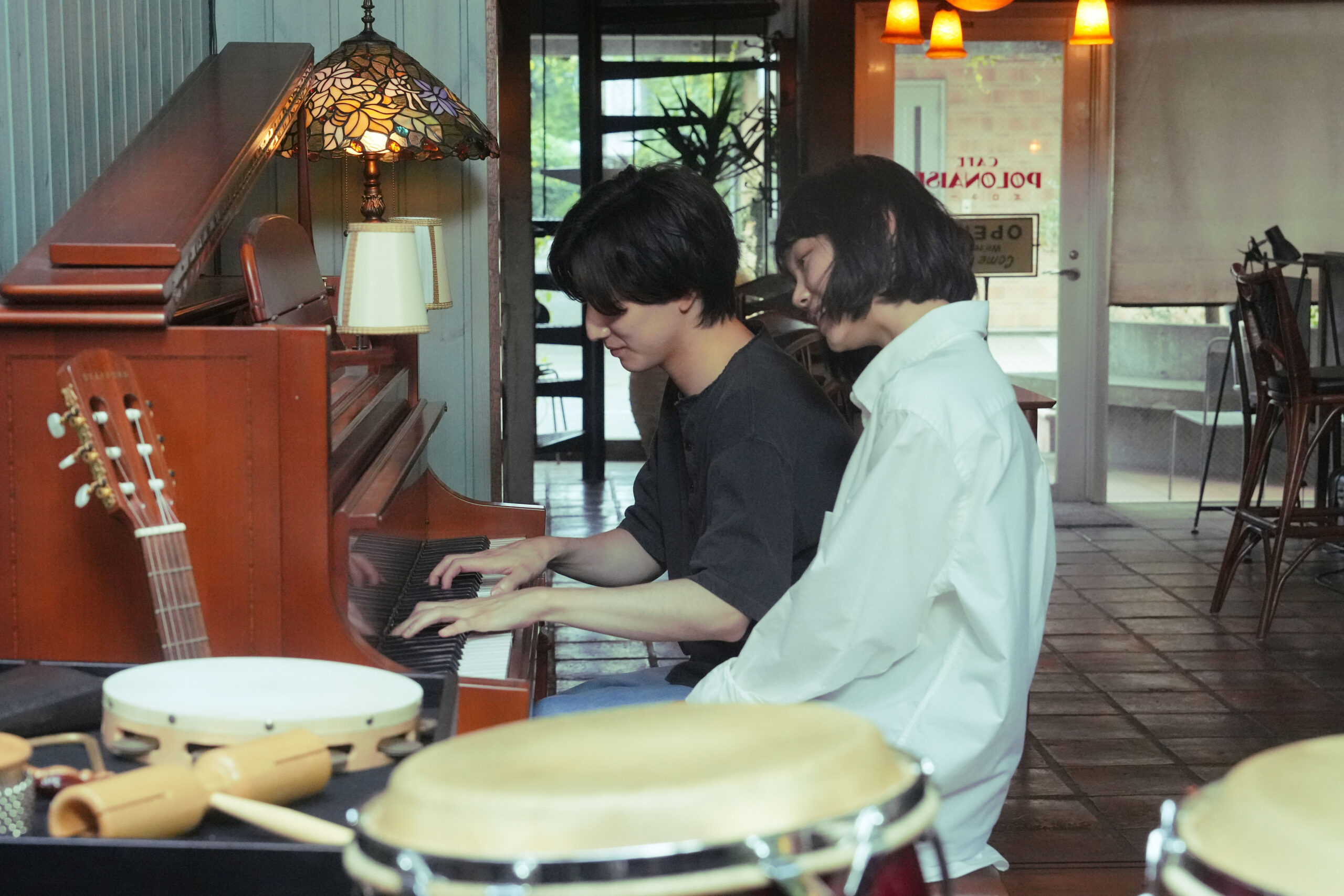 京本大我×古川琴音『言えない秘密』胸打たれるピアノ演奏シーンを切り取った場面写真解禁｜©︎2024「言えない秘密」製作委員会